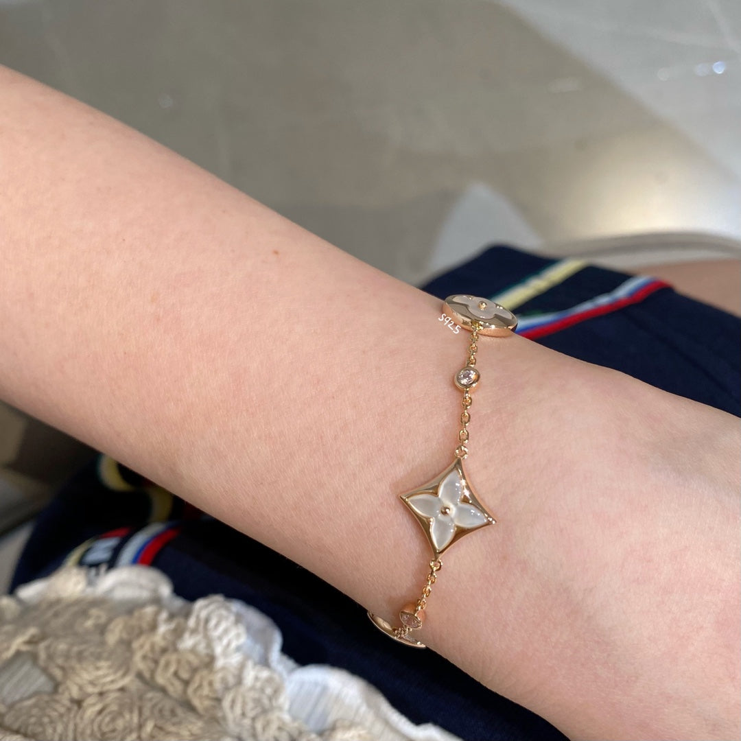[Super CiCi ]STAR AND SUN 4 MOTIF WHITE MOP PINK GOLD BRACELET